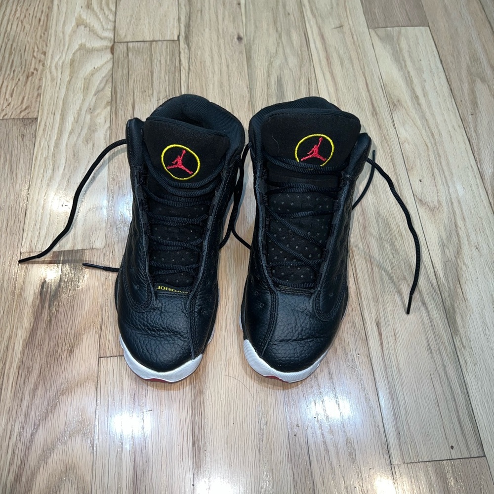 Black and Red Jordan 13 Sneakers with Holographic Detail
